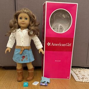American Girl Retired Nicki Doll with box, and some dog accessories.